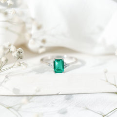 Certified 6X8 mm Lab Grown Emerald Cut Emerald Engagement Ring with Diamond Trio