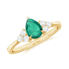 Certified Lab Grown Emerald Pear Shaped Engagement Ring with Diamond Trio
