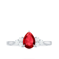 Pear Shaped Lab Ruby Engagement Ring with Diamond Trio