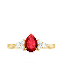 Pear Shaped Lab Ruby Engagement Ring with Diamond Trio