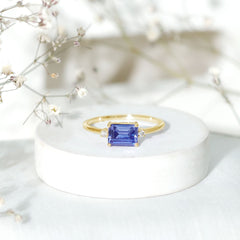 Octagon Cut Created Blue Sapphire East West Engagement Ring with Diamond