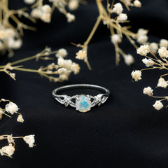 Natural Ethiopian Opal Crossover Engagement Ring with Floral Diamond