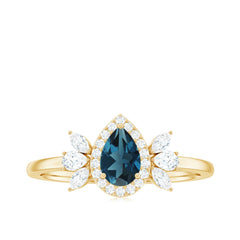 Pear Shaped London Blue Topaz Engagement Ring with Diamond Halo