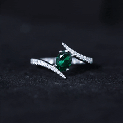 Certified 0.8 Carat Oval Cut Lab Grown Emerald Engagement Ring with Diamond Bypass Shank