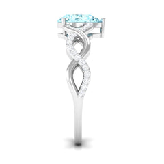 Natural Aquamarine Pear Shaped Engagement Ring with Diamond Infinity Shank