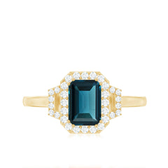 Emerald Cut Blue Topaz and Diamond Halo Engagement Ring