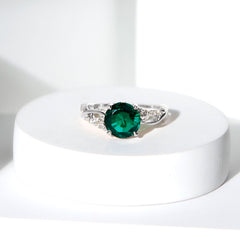 2 Carat Lab Grown Emerald and Diamond Engagement Ring with Crossover Shank