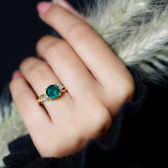 2 Carat Lab Grown Emerald and Diamond Engagement Ring with Crossover Shank