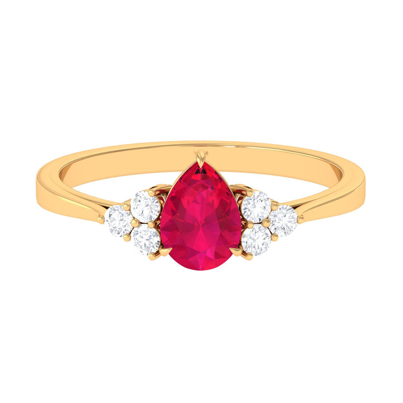 Claw Set Ruby Pear Solitaire Ring with Diamond Trio