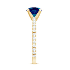 7mm Round London Blue Topaz Solitaire Ring with Diamond Side Stones