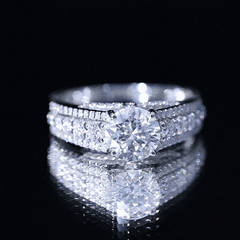 Round Brilliant Cut Moissanite Side Stone Engagement Ring