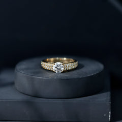 Round Moissanite Engagement Ring with Side Stones