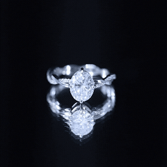 Moissanite Oval Engagement Ring With Diagonal Prong Setting