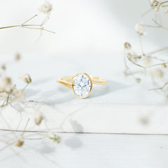 Solitaire 7X9 MM Moissanite Oval Engagement Ring with Bypass Shank