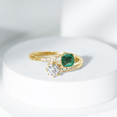 Emerald and Moissanite Two Stone Engagement Ring in Bypass Shank
