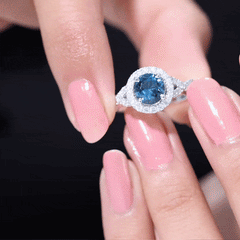 7mm Round London Blue Topaz Crossover Engagement Ring with Diamond Halo