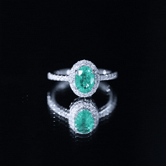 Real 0.7 Carat Oval Emerald Engagement Ring with Diamond Halo