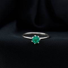 0.8 Carat Round Lab Grown Emerald Solitaire Ring in Lotus Basket Setting