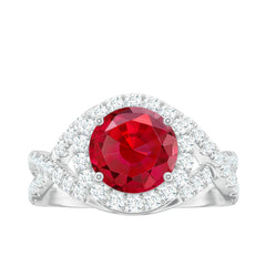 Round Created Ruby Crossover Engagement Ring With Moissanite