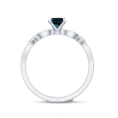 Round Blue Topaz Infinity Engagement Ring with Diamonds