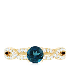 Round Blue Topaz Infinity Engagement Ring with Diamonds