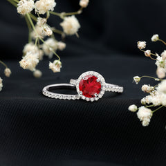 Split Shank Round Created Ruby Solitaire Ring with Surprise Diamond