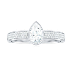 Pear Cut Moissanite Bezel Set Engagement Ring With Side Stones
