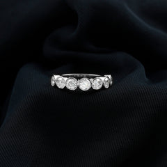 2.2 Carat Round Moissanite Half Eternity Ring in Bezel Setting