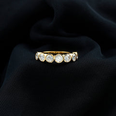 2.2 Carat Round Moissanite Half Eternity Ring in Bezel Setting