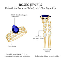 1.6 Carat Pear Lab Grown Blue Sapphire Engagement Ring with Diamond Band