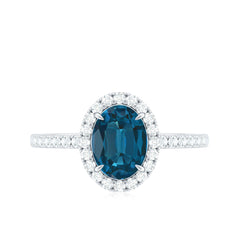 Oval 6X8MM London Blue Topaz Halo Engagement Ring