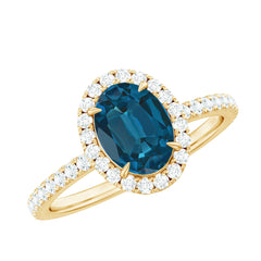 Oval 6X8MM London Blue Topaz Halo Engagement Ring