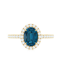 Oval 6X8MM London Blue Topaz Halo Engagement Ring