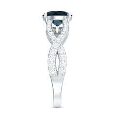 Real London Blue Topaz Crossover Engagement Ring with Diamond