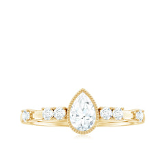 5X7mm Pear Cut Moissanite Solitaire Engagement Ring with Beaded Details