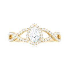 Pear Shaped Moissanite Crossover Engagement Ring with Halo