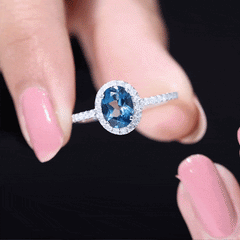 6X8mm Oval Cut London Blue Topaz Classic Engagement Ring with Diamond Halo