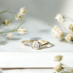 Pear Cut Moissanite Bypass Engagement Ring with Side Stones