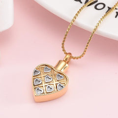 Gold Heart Shaped Cremation Urn Necklace With Silver Hearts