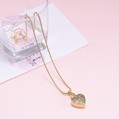 Gold Heart Shaped Cremation Urn Necklace With Silver Hearts