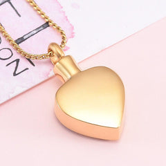 Gold Heart Shaped Cremation Urn Necklace With Silver Hearts
