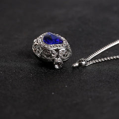 Silver Heart Shaped Cremation Urn Necklace with Rhinestones and Blue Gem